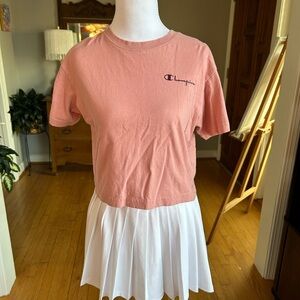 Champion Coral Tee with Logo and White Pleated Skirt